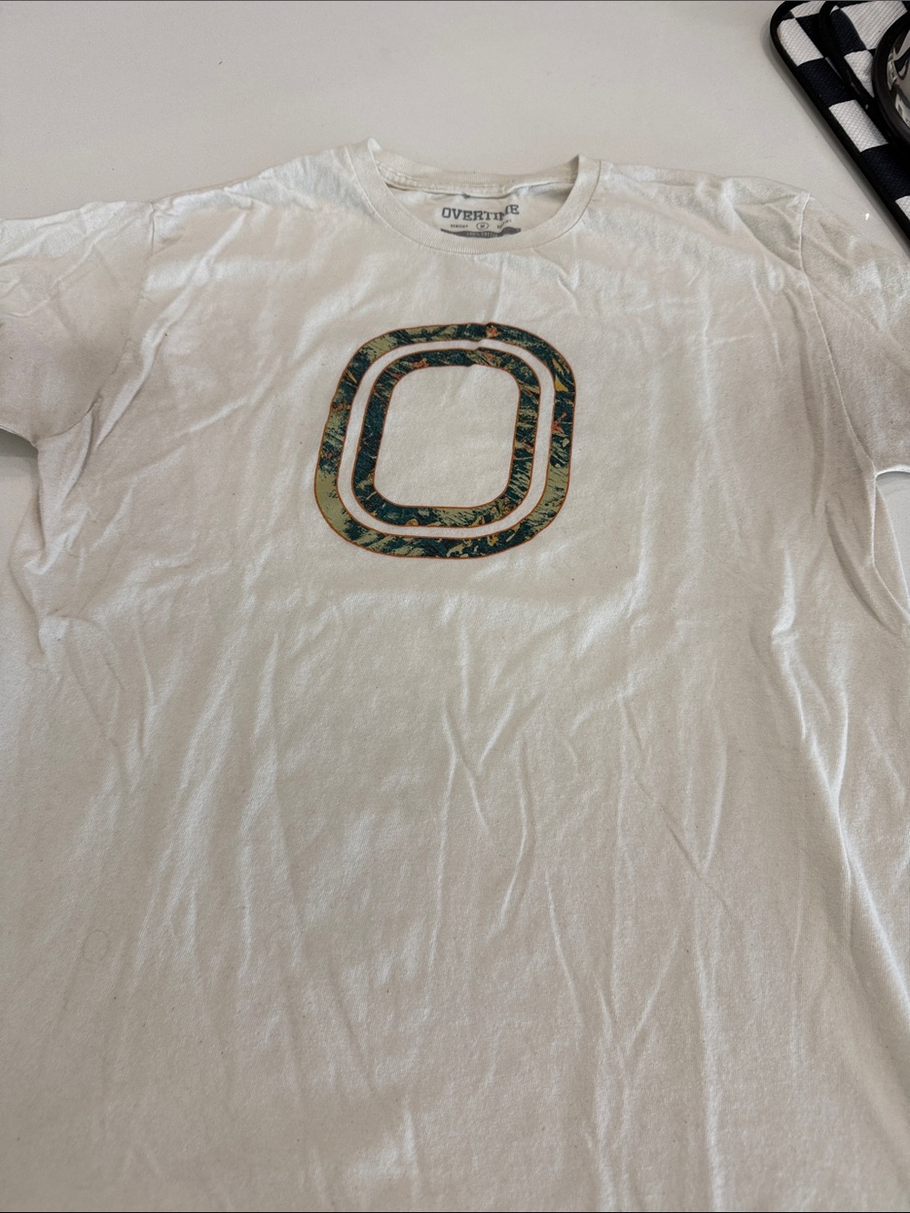 Overtime White Short-Sleeve Tee with Green Accent Graphic